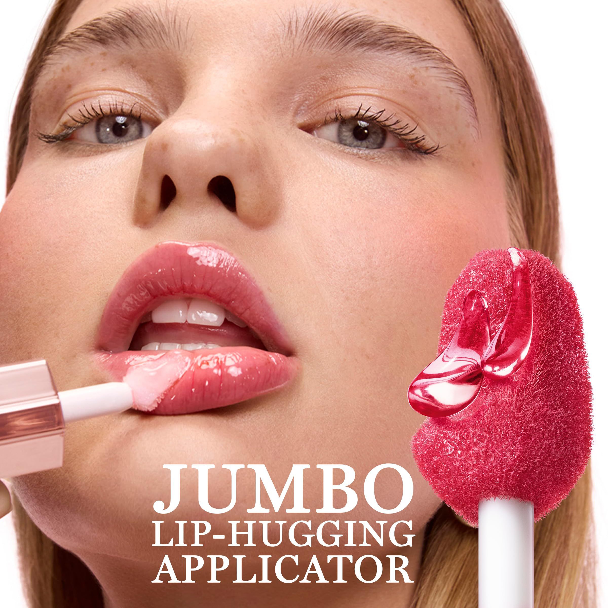 Femme avec gloss à lèvres Lancôme Juicy Tubes appliqué. Texte : Applicateur Jumbo Lip-Hugging. Grand applicateur.