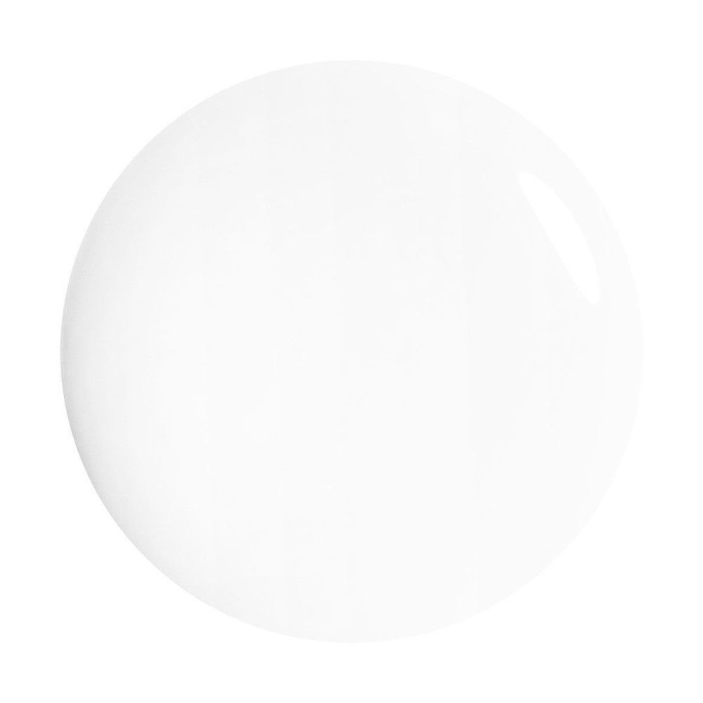 Tache de vernis à ongles blanche, ronde. Surface brillante.