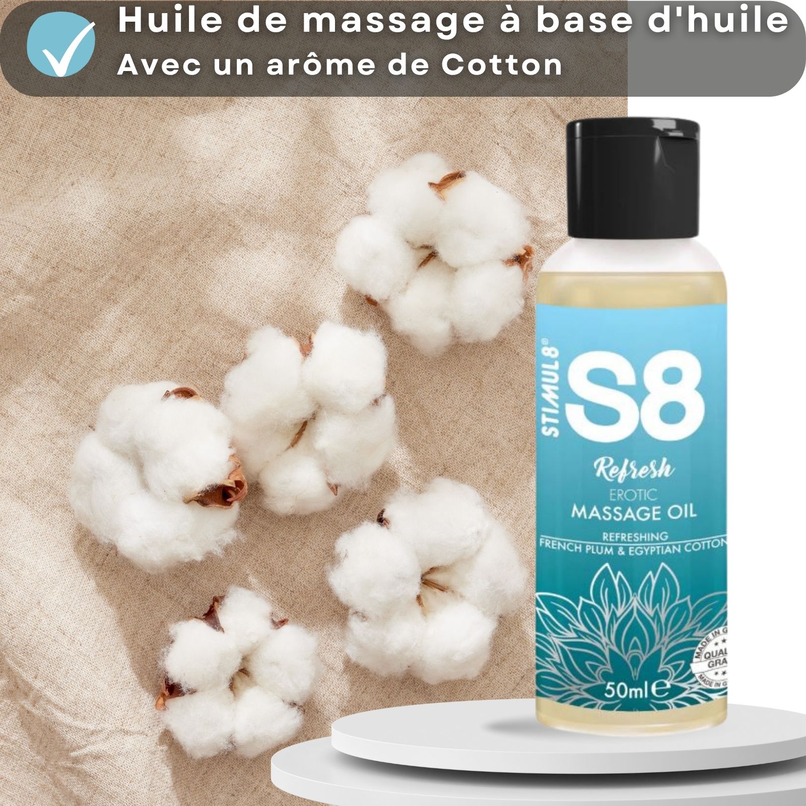 Huile de massage à base d'huile parfum Cotton. Flacon avec bouchon noir. Texte : S8, Refresh, 50ml. Fleurs de coton.