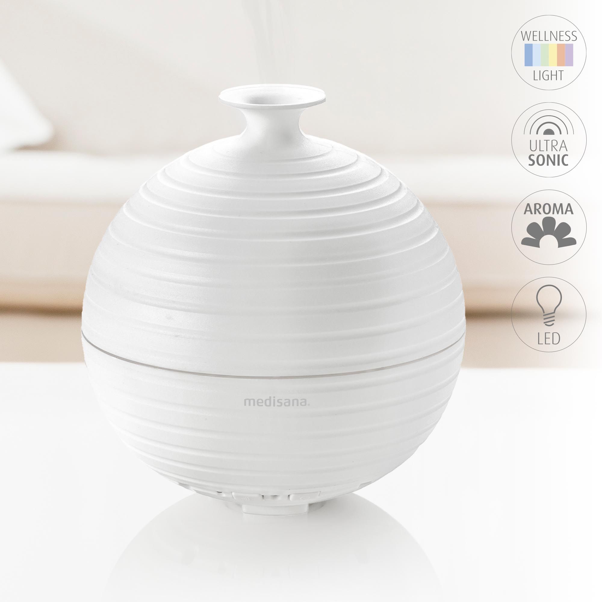 Diffuseur d'arôme blanc avec icônes pour lumière, ultrasons et arôme.