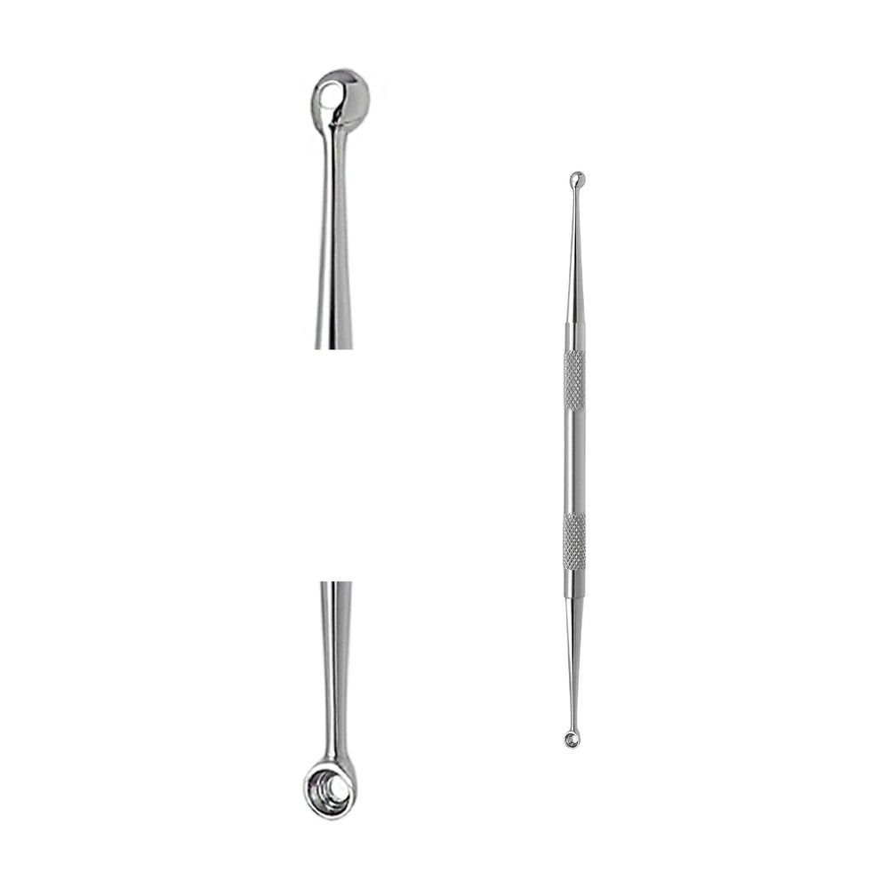 Extracteur de comédons double face en métal. Une extrémité en boucle, l'autre pointue. Moletage central.