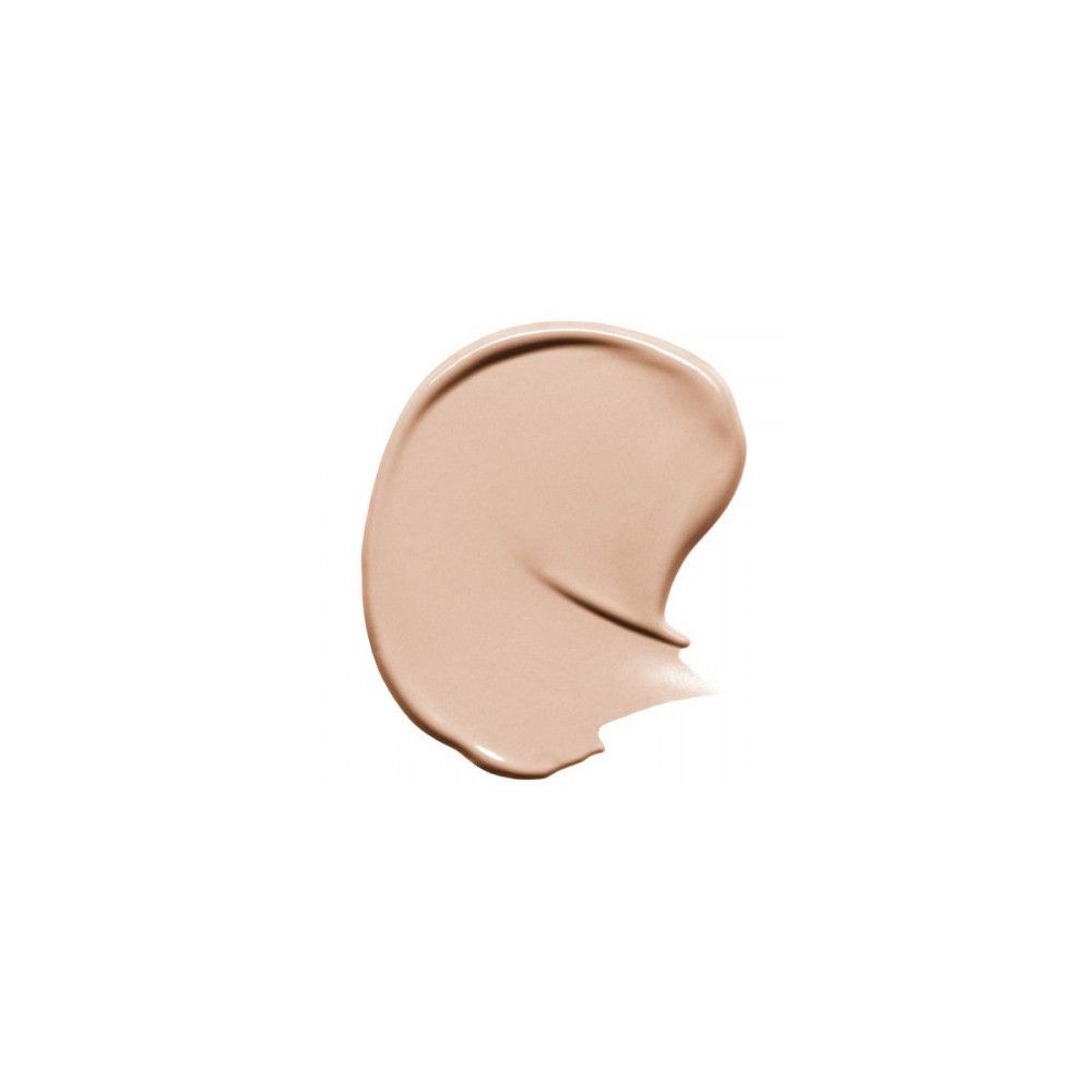 Tache de correcteur clair sur fond blanc. Texture crémeuse. Teinte: claire.