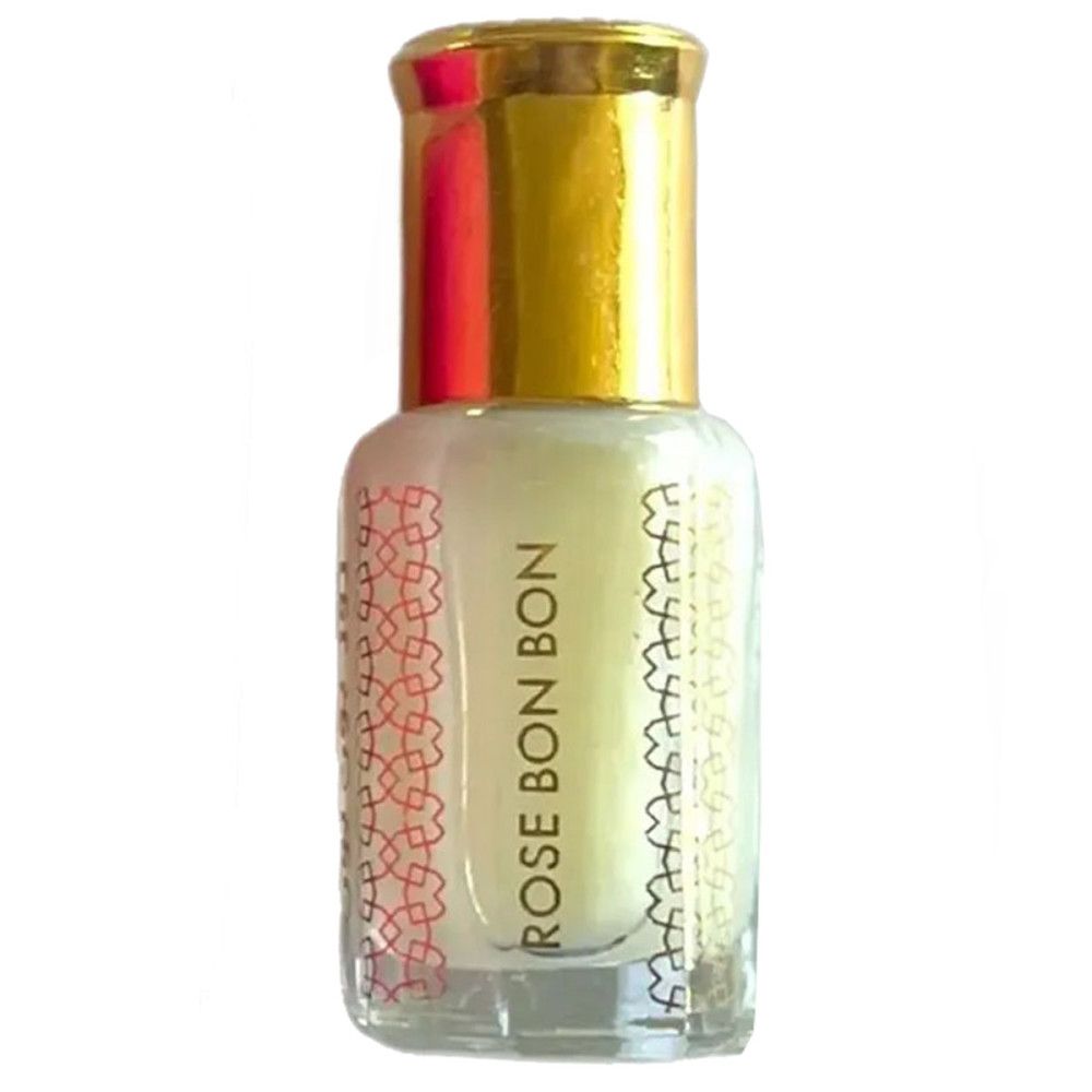 Flacon de parfum concentré. Bouchon doré. Inscription Rose Bon Bon et motifs arabes.
