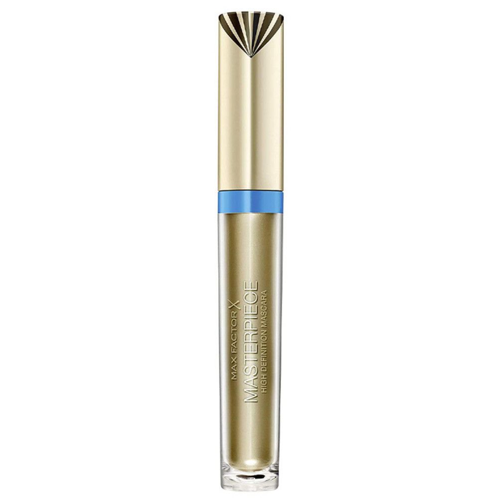 Tube de mascara doré avec bande bleue. Nom du produit et marque visibles. Le couvercle a un motif décoratif.