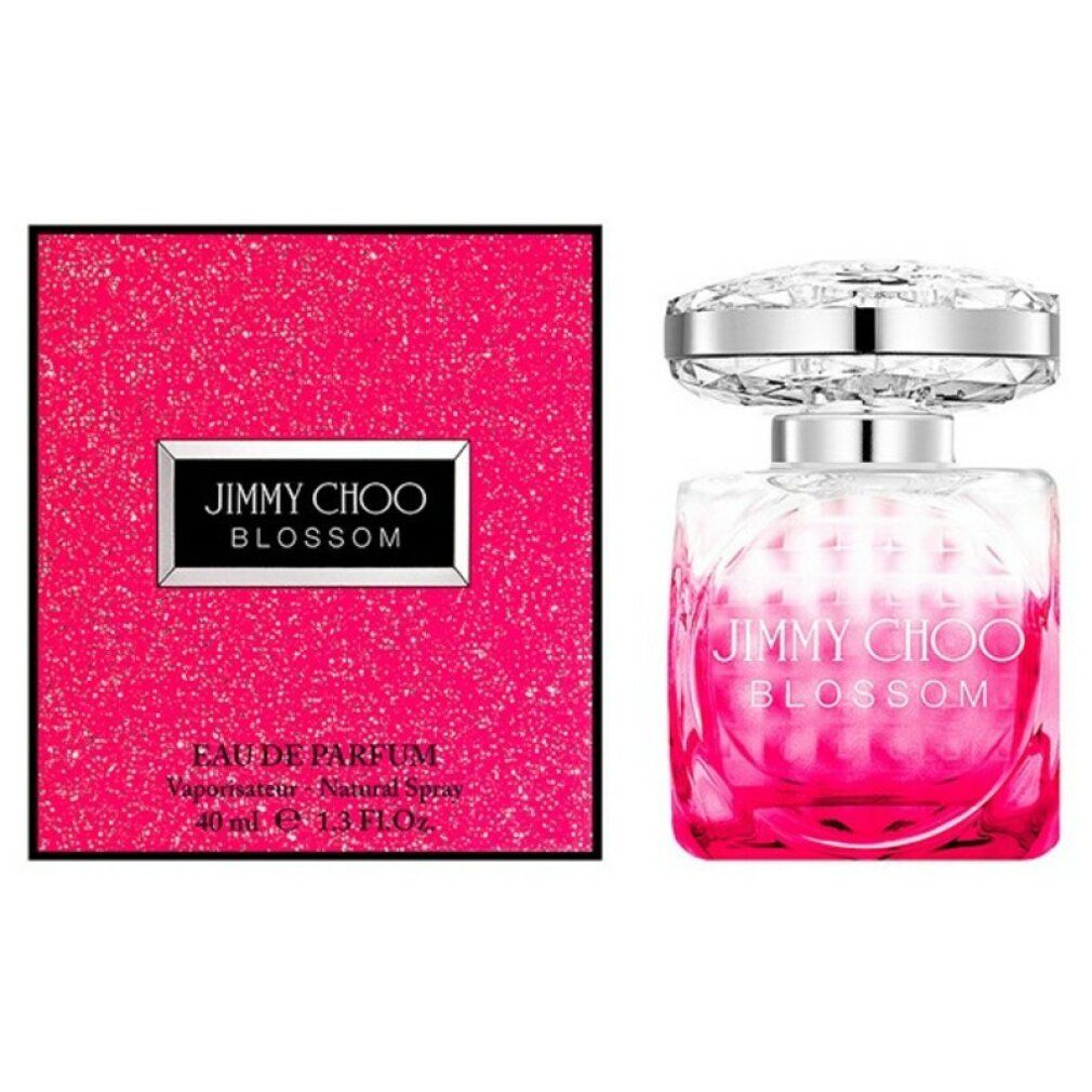 Jimmy Choo Blossom e.d.p. Spray. Fles met zilveren dop en roze kleurverloop. Roze verpakking met logo.