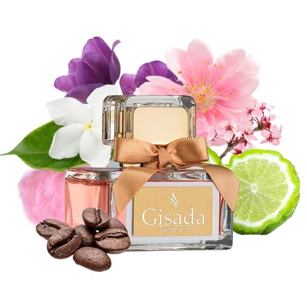 Gisada parfumfles met gouden strik, omringd door bloemen, koffiebonen en een schijfje limoen.