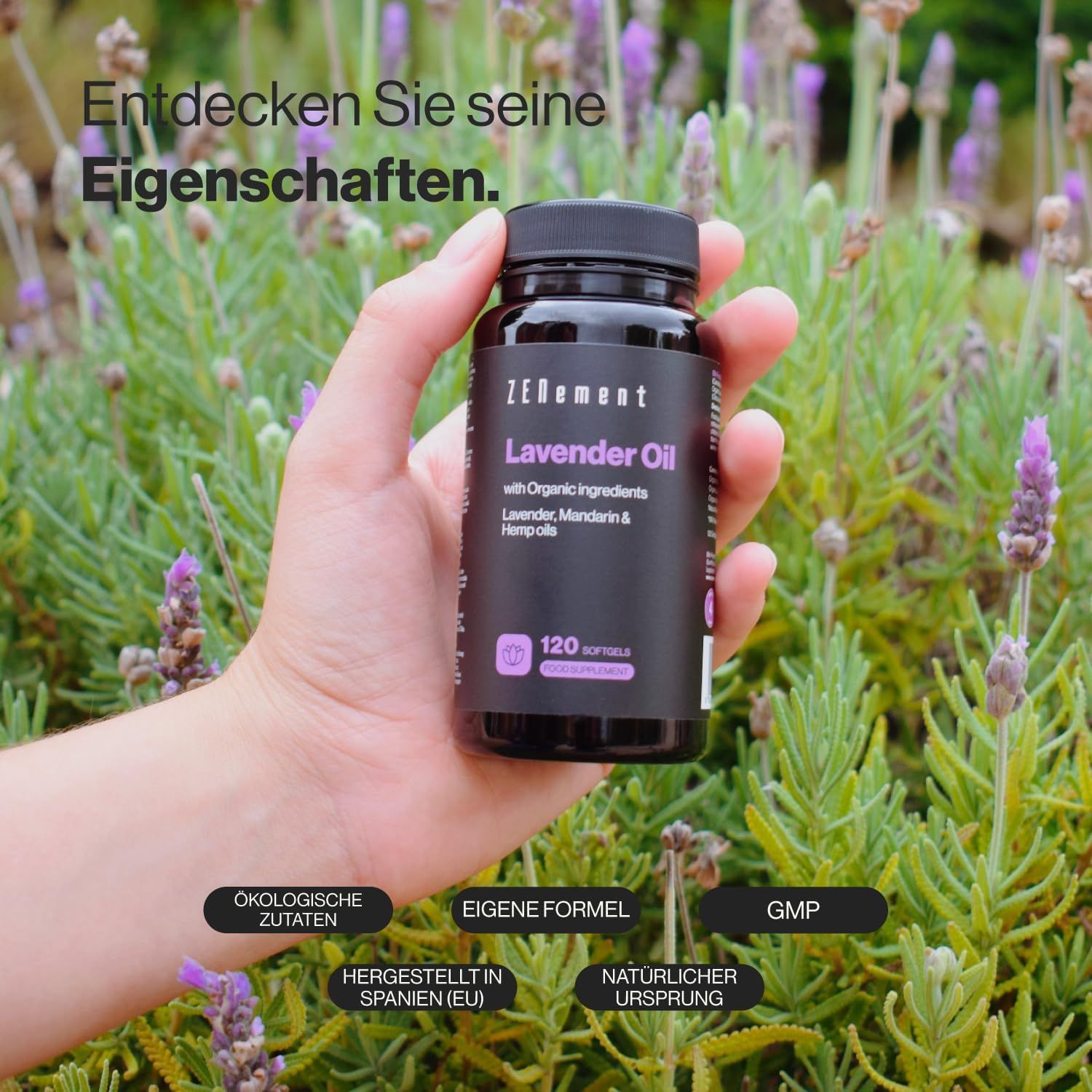 Flacon noir de capsules Zenement Lavendelöl. Main tenant le flacon devant des fleurs de lavande. Texte : "120 capsules".