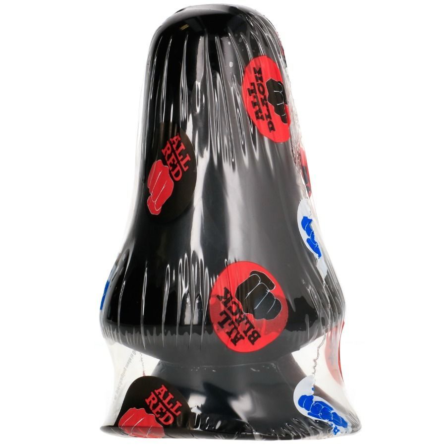 Plug anal noir emballé dans du film plastique, avec des autocollants ronds.