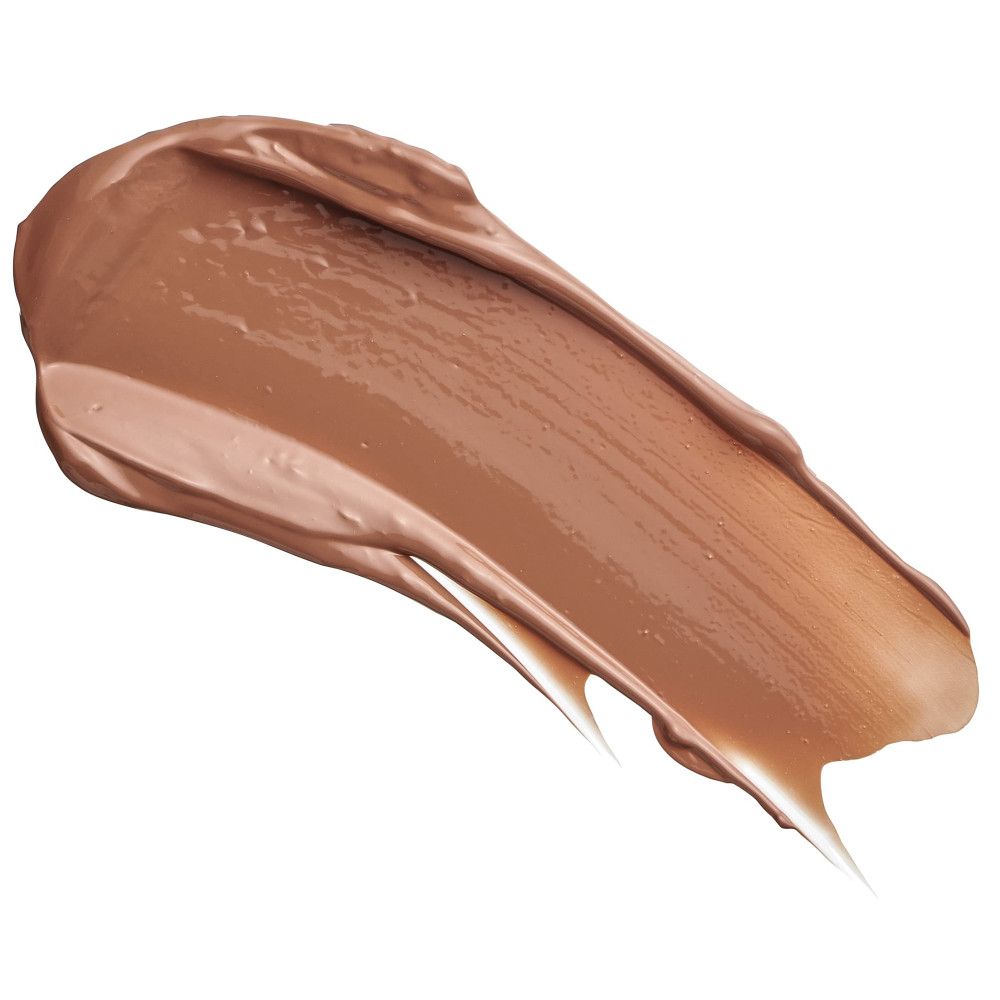 Étalement de rouge à lèvres crème. Texture crémeuse et claire. Aucun emballage visible.