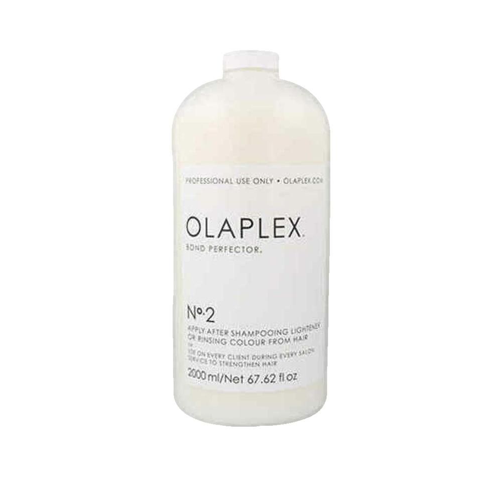 Grote witte fles met etiket. Opschrift: OLAPLEX Bond Perfector N°2. Volume: 2000 ml.