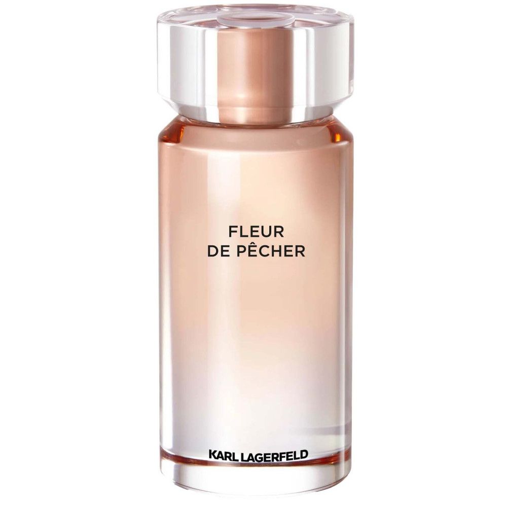 Fles met opschrift FLEUR DE PÊCHER, KARL LAGERFELD. Transparante fles met roze kleurverloop. Transparante dop.