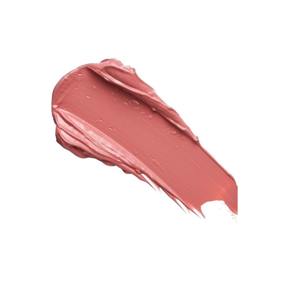 Échantillon de rouge à lèvres rose sur fond blanc. Texture visible.