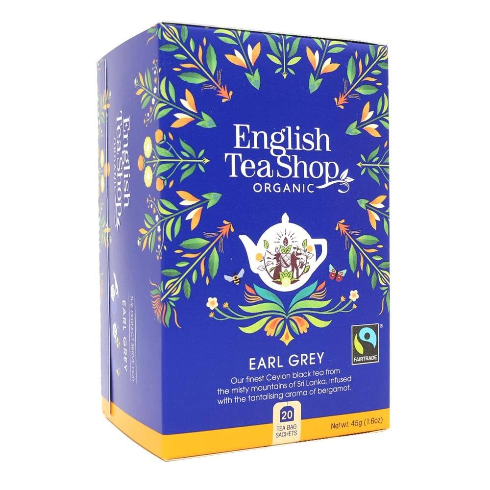 Blauwe doos met opschrift: English Tea Shop, Earl Grey, Organic. Fairtrade-label. 20 theezakjes. Vierkante vorm.