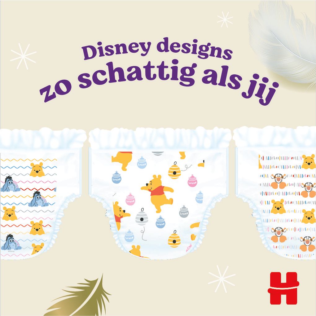 Couches avec motifs Winnie l'Ourson. Texte: Designs Disney aussi mignons que vous. Logo Huggies.