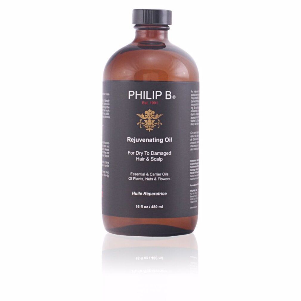 Bouteille d'huile revitalisante Philip B. pour cheveux et cuir chevelu secs à abîmés.