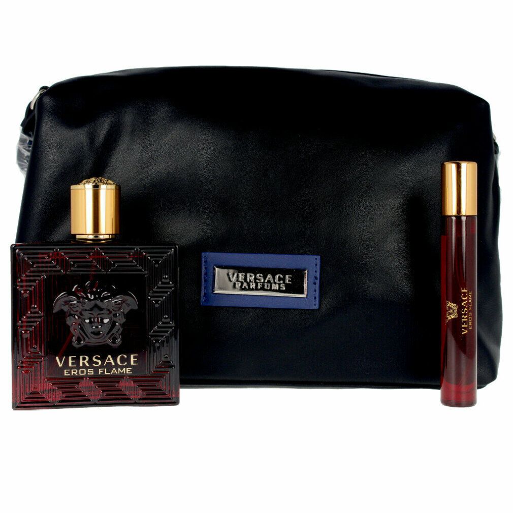 Zwarte toilettas, fles en roller. Fles met gouden dop. Tekst: Versace Eros Flame.