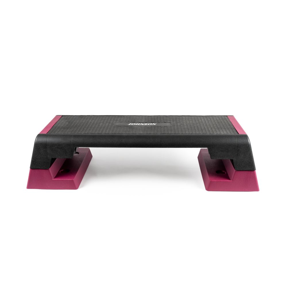 Aerobic stepper. Zwart en roze. Gekarteld oppervlak. Merk JOHNSON.