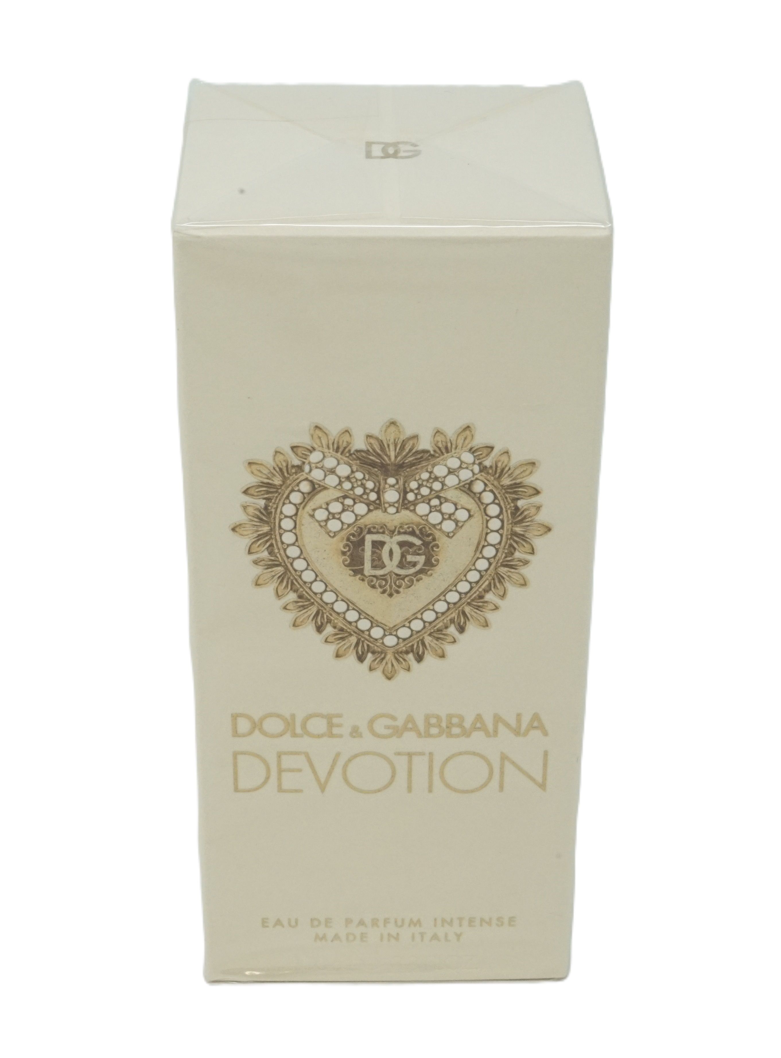 Emballage de parfum crème avec logo cœur et inscription Devotion. Marque Dolce & Gabbana. Logo en haut.