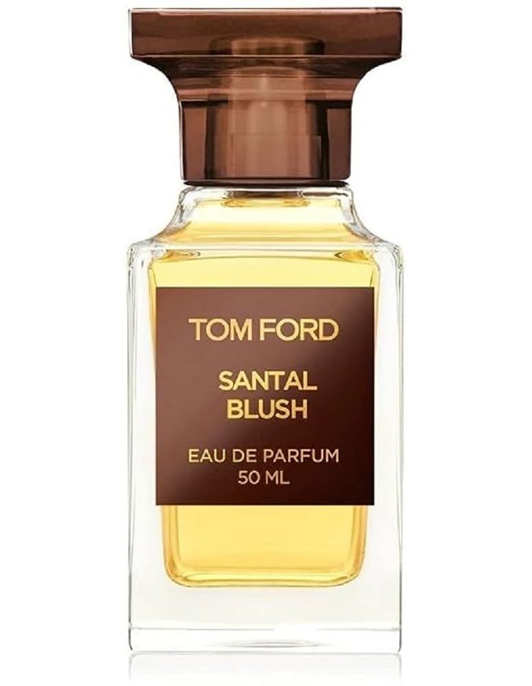 Glazen fles met bruine dop. Opschrift: TOM FORD, SANTAL BLUSH, Eau de Parfum. 50 ml.