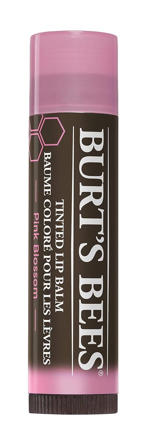 Baume à lèvres Pink Blossom de Burt's Bees. Tube rose avec texte blanc. Fond noir.