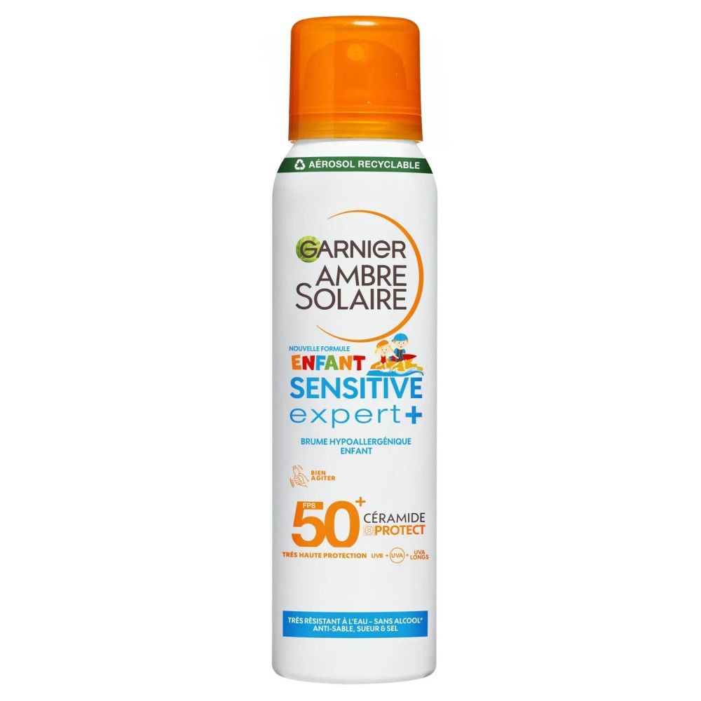 Flacon de spray solaire blanc avec bouchon orange. Inscriptions : Garnier Ambre Solaire, Sensitive Expert+, SPF 50.