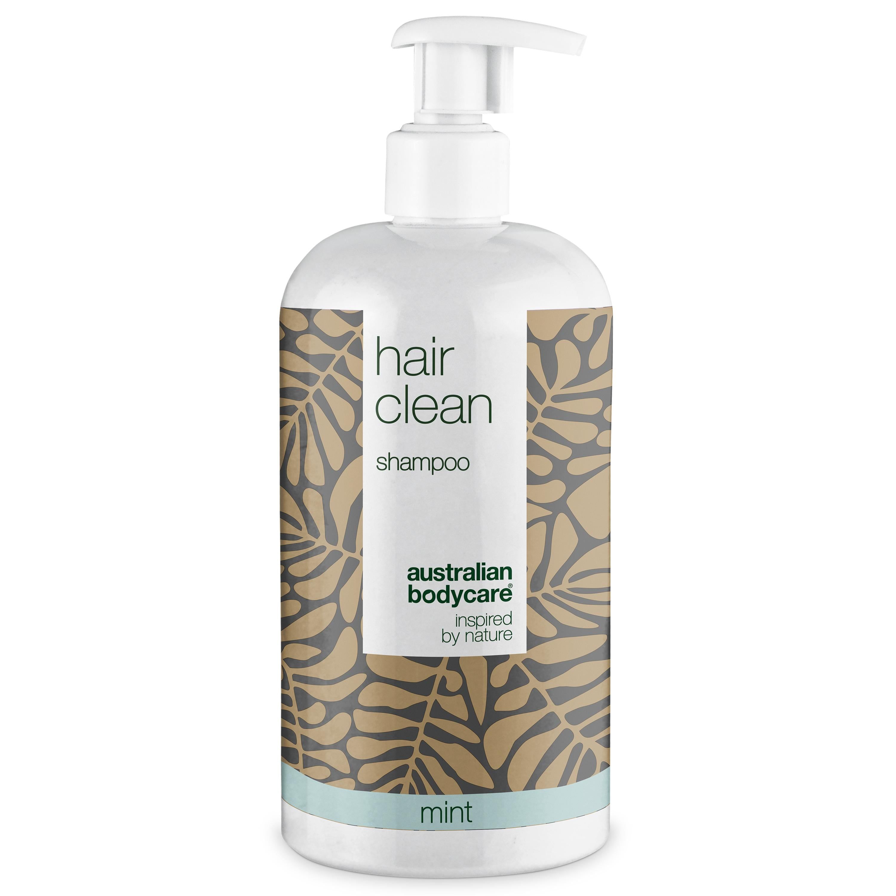 Witte shampoo fles met pomp. Opschrift: hair clean shampoo, australian bodycare, mint.