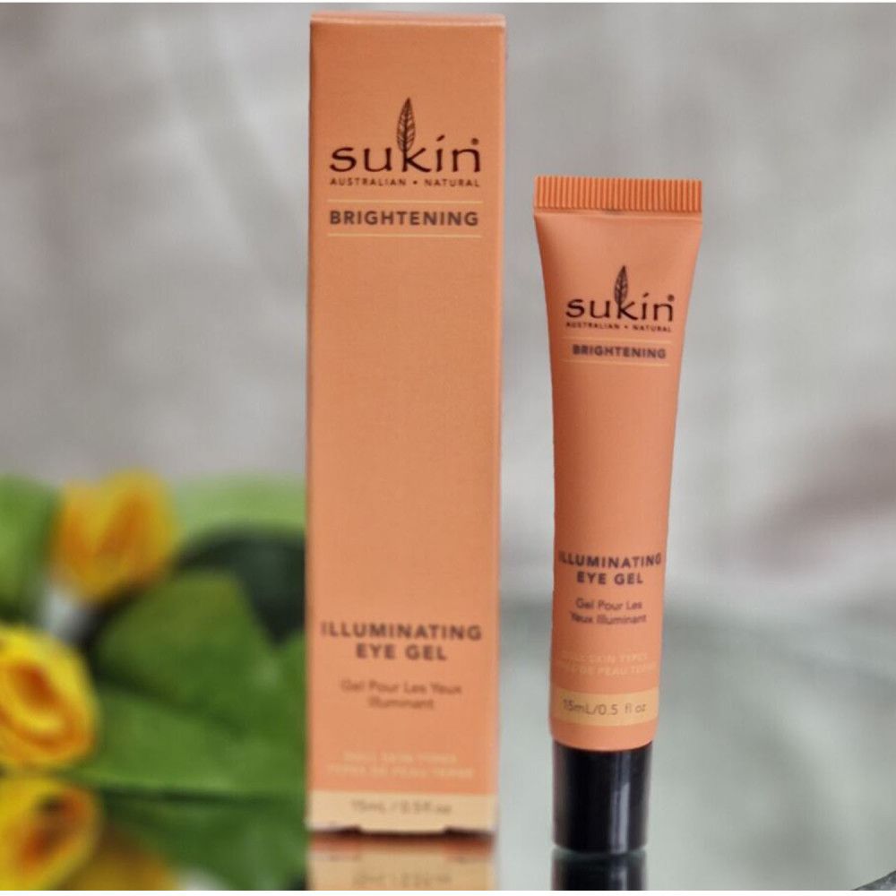 Tube et boîte beiges. Inscription: Sukin, Illuminating Eye Gel, Brightening. 15ml/0.5 fl oz.