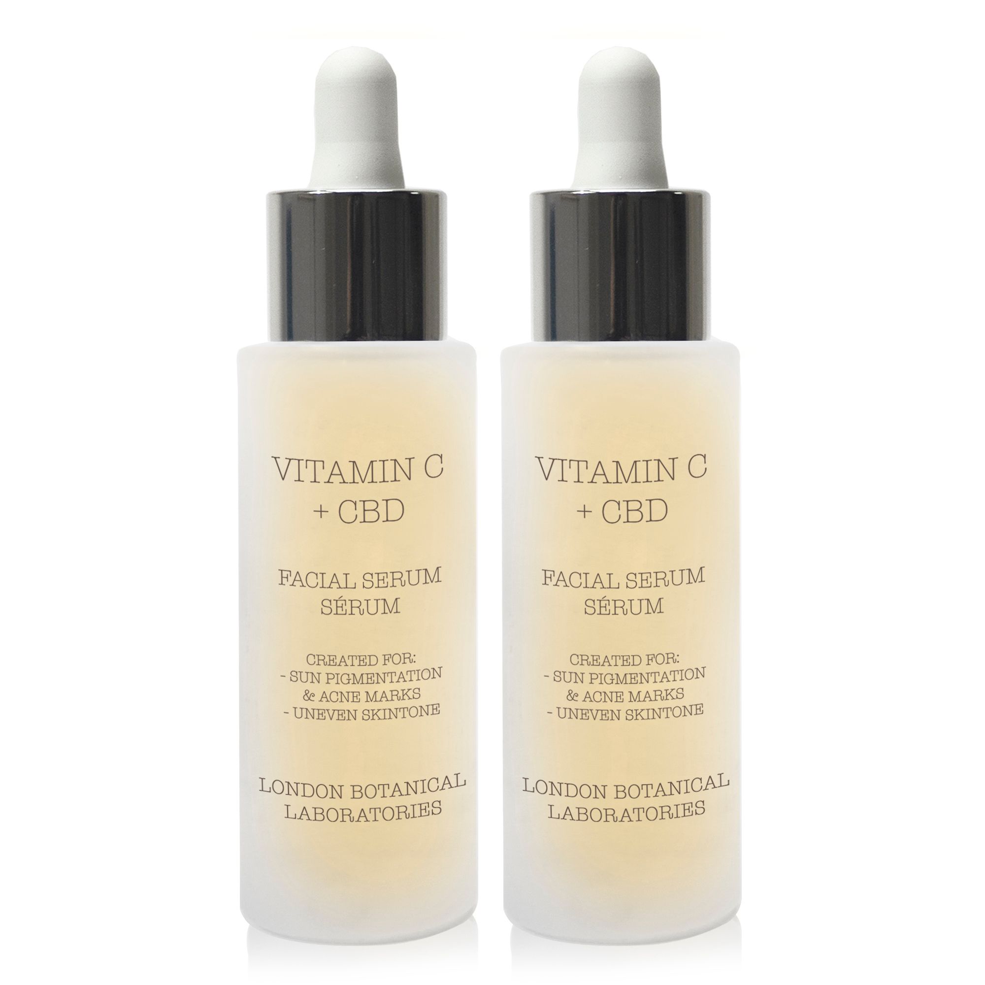 Deux flacons de sérum avec pipettes. Inscription: Vitamin C + CBD. Texte: Facial Serum, London Botanical Laboratories.