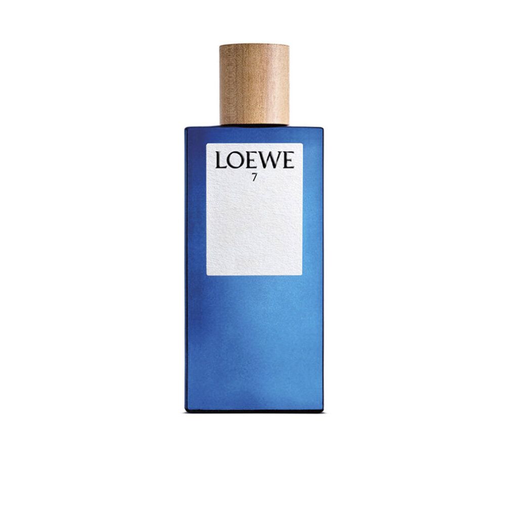 Blauwe fles met houten dop en witte tekst.