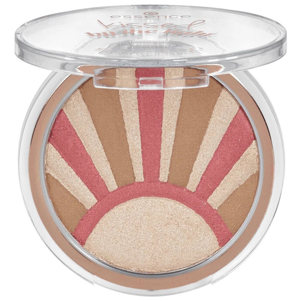 Poudre ronde avec motif soleil. Rose, beige et marron. Couvercle transparent. Nom du produit non visible.
