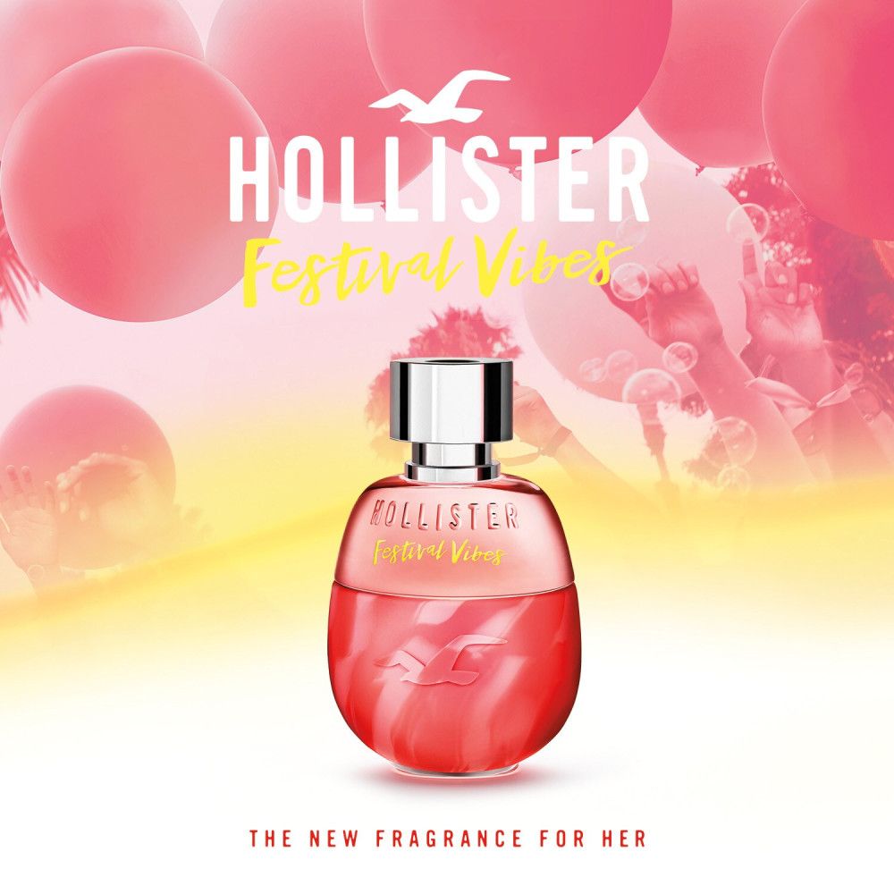 Rode fles met zilveren dop. Opschrift: Hollister Festival Vibes. Achtergrond: roze ballonnen en silhouet.