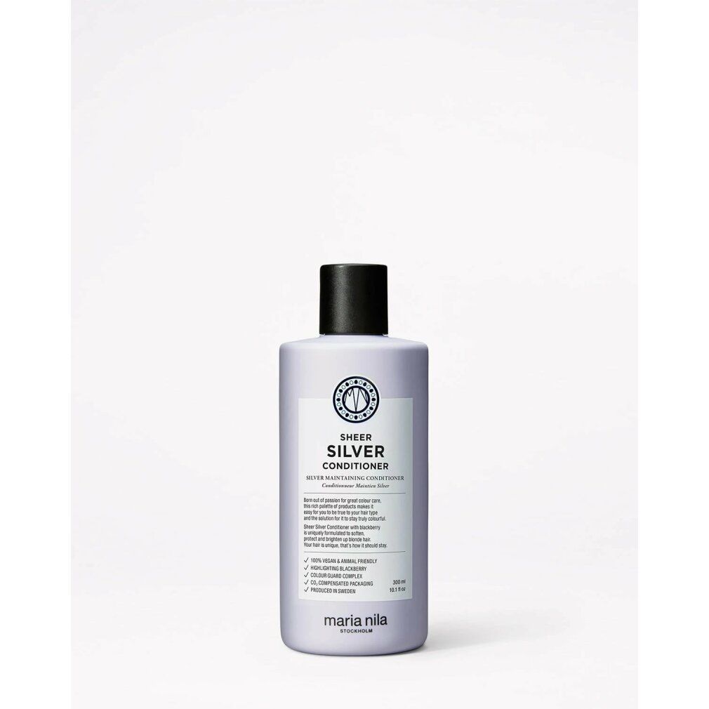 Bouteille violette de Sheer Silver Conditioner, bouchon noir, étiquette avec informations produit et logo.