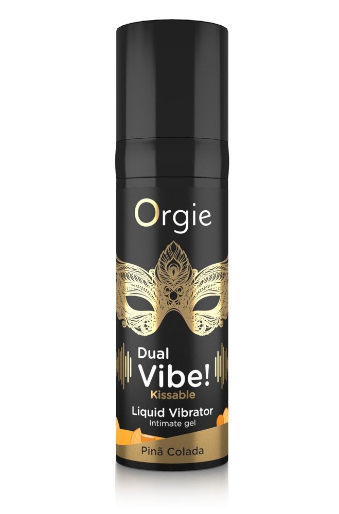 Zwarte fles met gouden masker en tekst. "Dual Vibe! Kissable Liquid Vibrator" en "Pinã Colada" zijn zichtbaar.