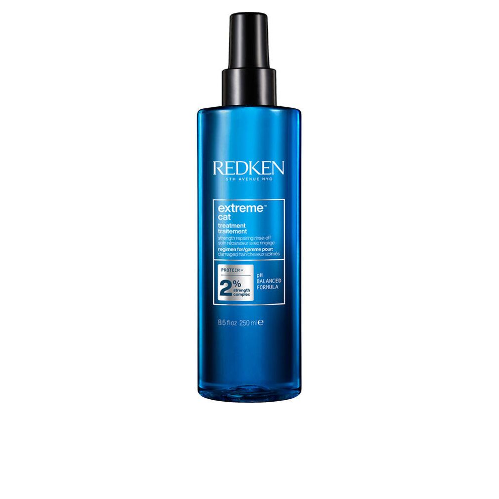 Redken Extreme Cat Treatment. Blauwe fles met zwarte spraykop. Tekst: Extreme, pH-gebalanceerde formule, 2% sterkte.