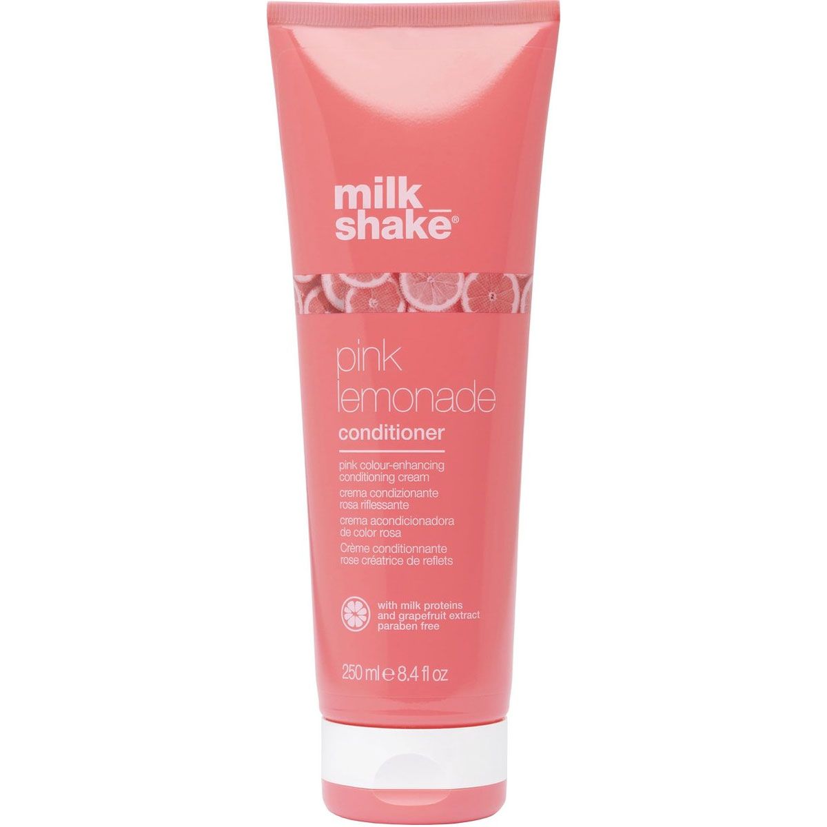 Bouteille rose Milk_Shake Pink Lemonade Conditioner avec bouchon blanc et agrumes.
