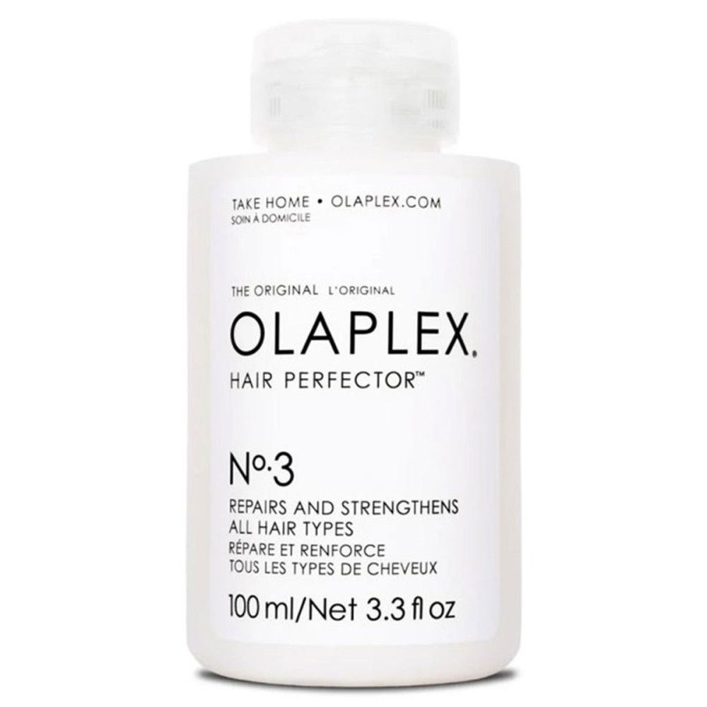 Olaplex No. 3 Hair Perfector fles. Witte, rechthoekige fles met witte dop. Tekst: Olaplex, No. 3, 100 ml.