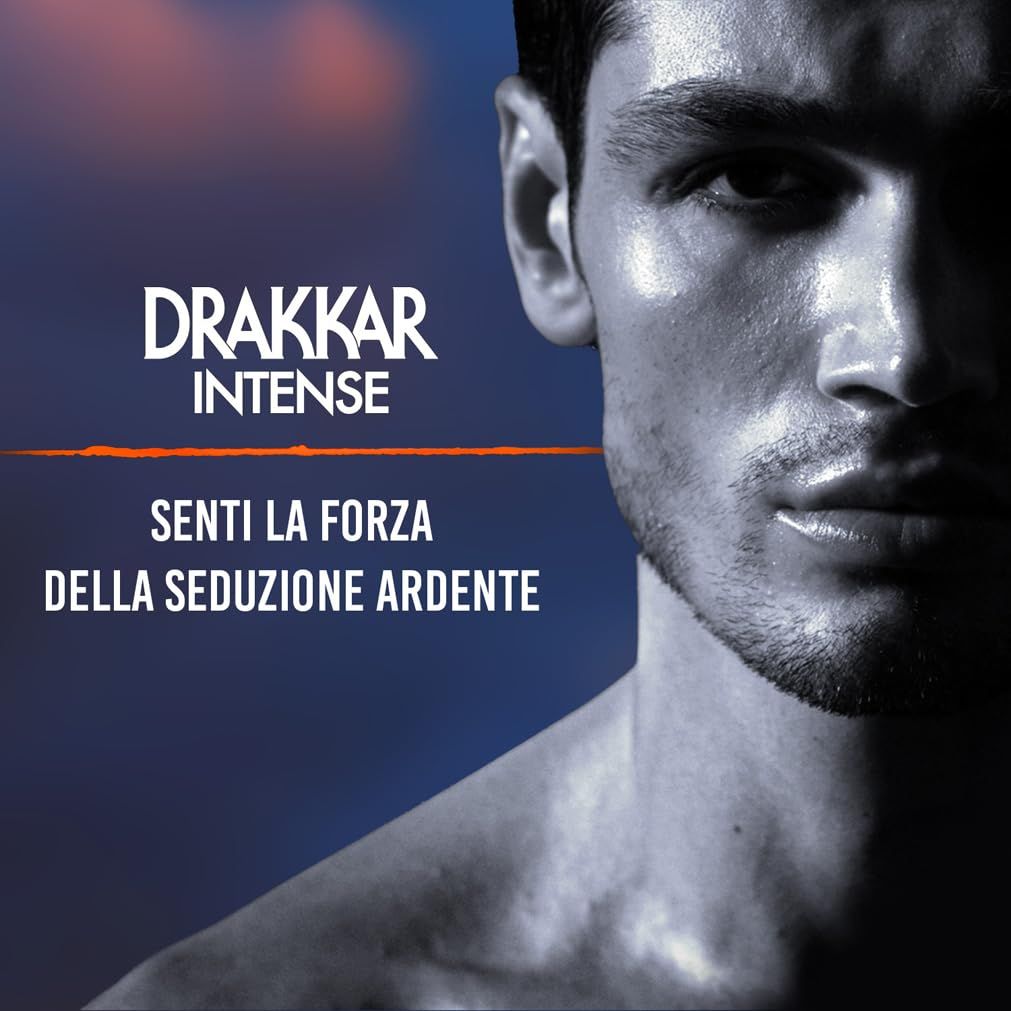 Flacon et emballage Drakkar Intense. Boîte noire avec accents orange. Inscription: Drakkar Intense, Guy Laroche.