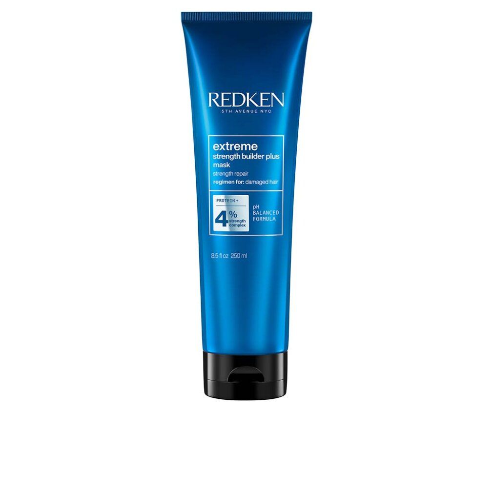 Tube bleue Redken Extreme Strength Builder Plus. Texte: extreme strength builder plus mask. 250ml. pH Balanced Formula.