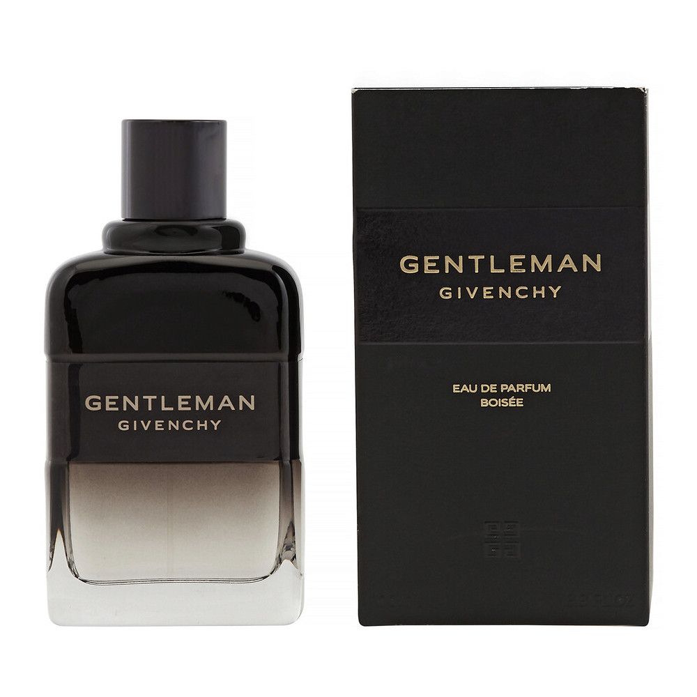 Flacon et boîte noirs. Inscription: Gentleman Givenchy Eau de Parfum Boisée. Flacon avec dégradé de couleur.