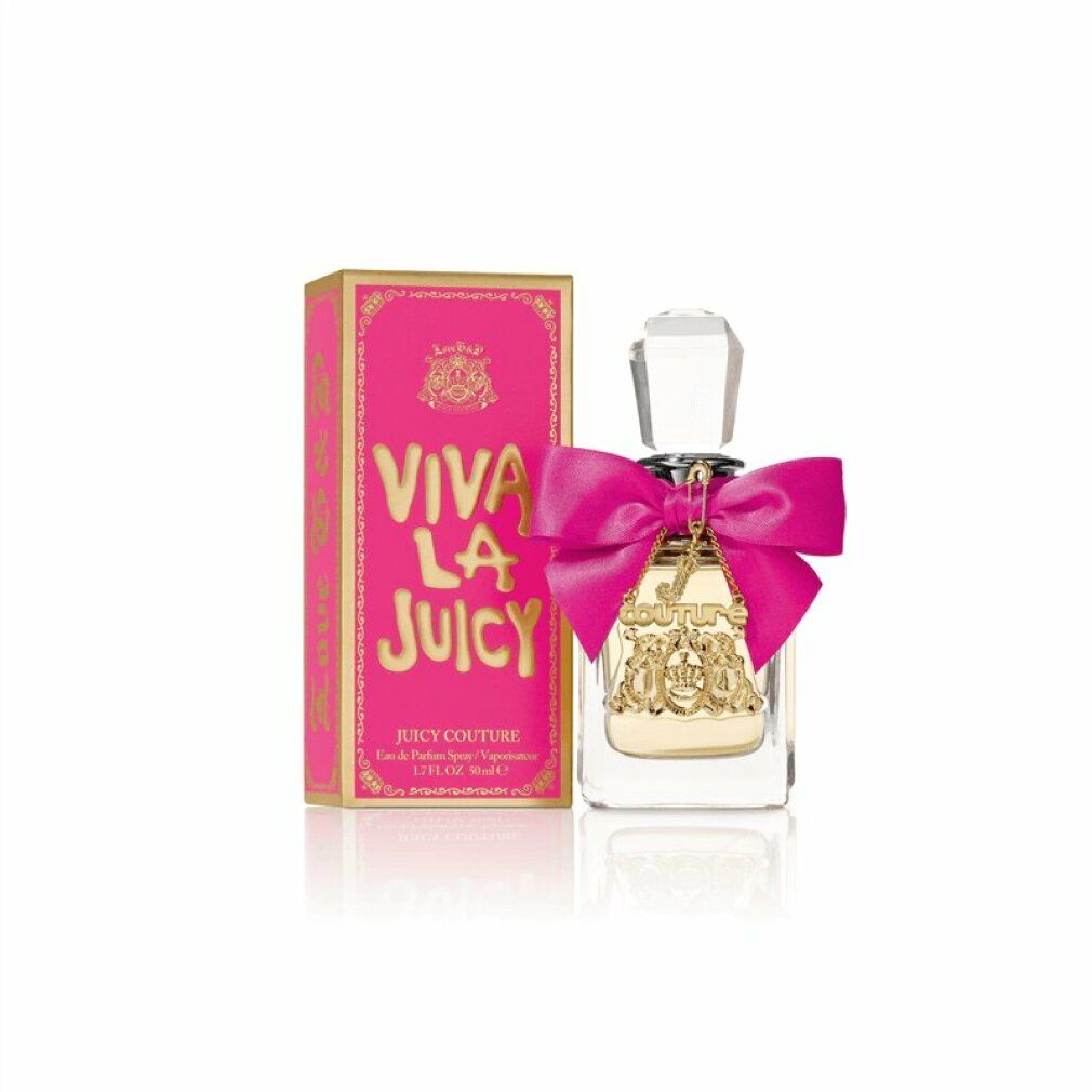 Flacon de parfum et boîte. Flacon avec nœud rose. Boîte rose avec texte doré.
