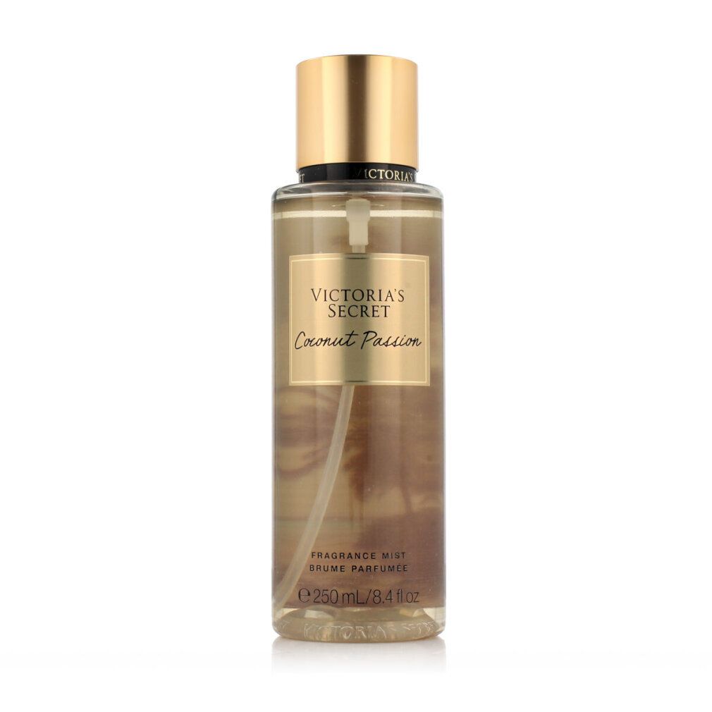 Body mist fles met gouden dop. Etiket met Victoria's Secret en Coconut Passion.