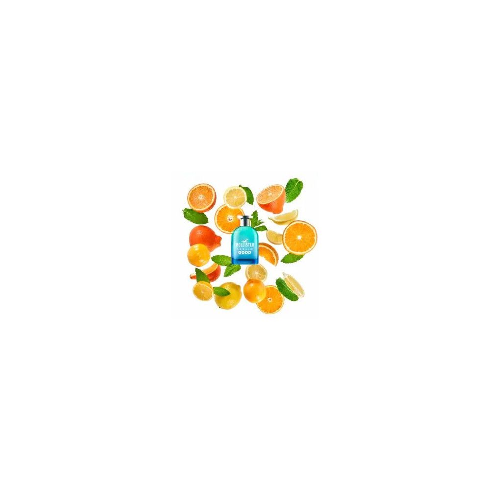 Flacon bleu-vert entouré d'agrumes et de feuilles.