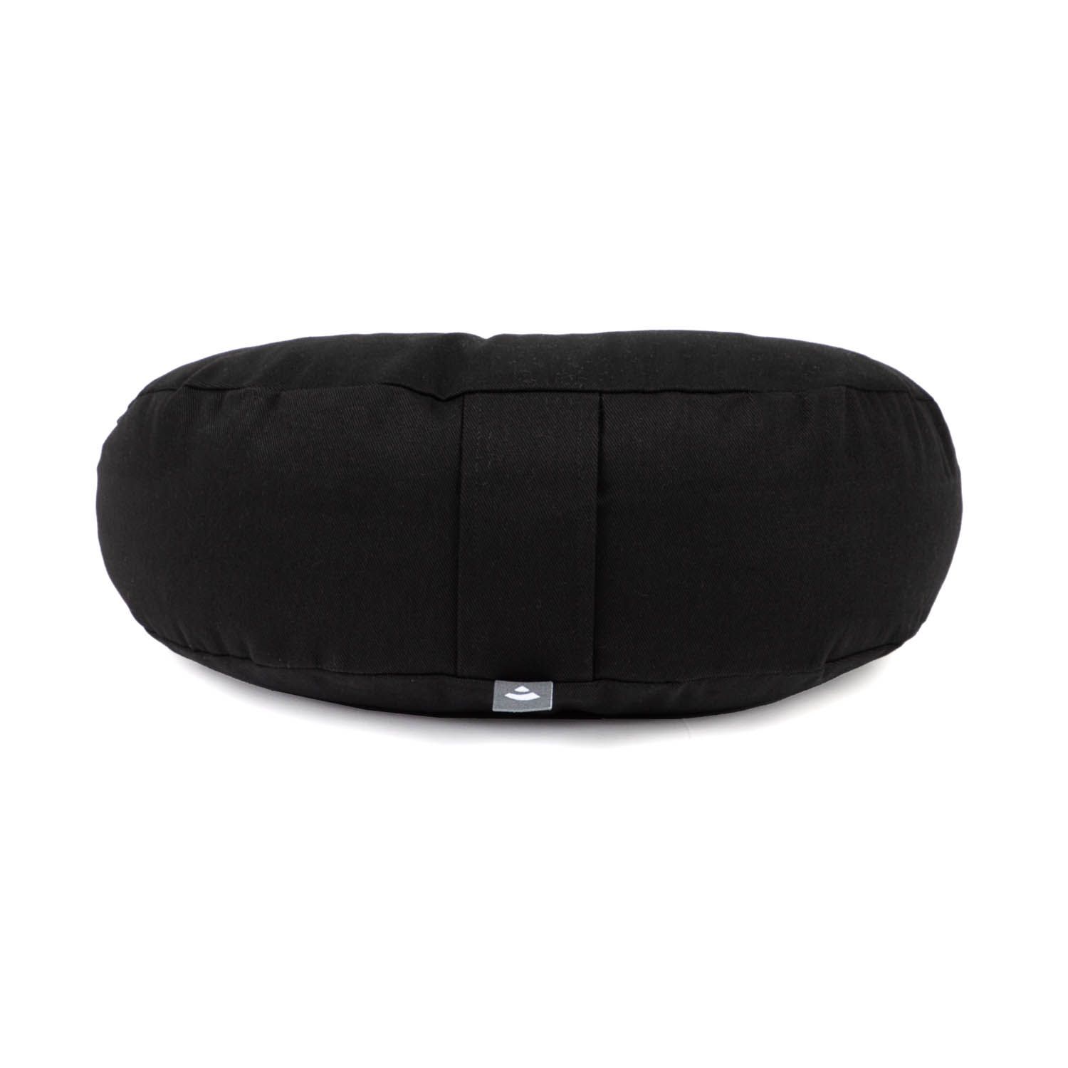 Coussin de méditation rond noir avec une petite étiquette logo.