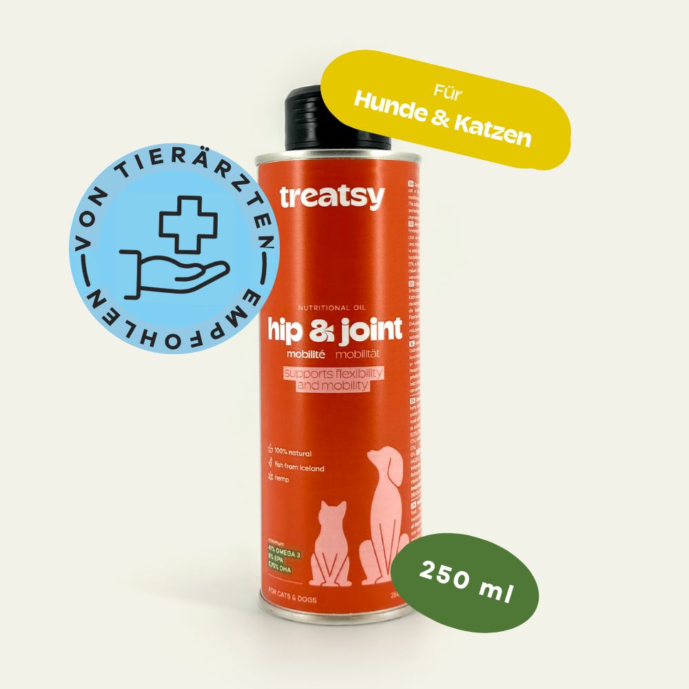 Cilindervormige bus met zwarte deksel. Opschrift: Treatsy, hip & joint, Mobiliteit. Voor honden & katten. Zegel: Aanbevolen door dierenartsen.