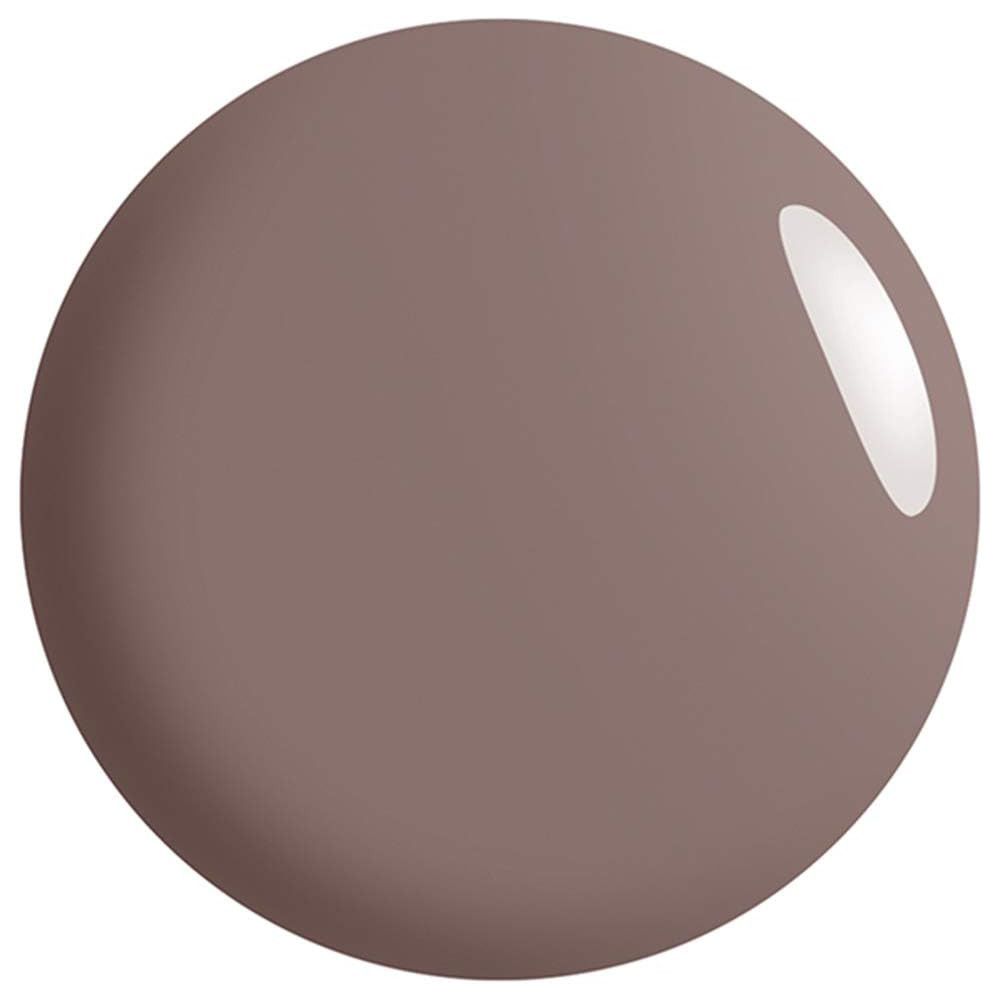 Tache ronde et brillante de couleur marron clair. Avec un reflet lumineux.