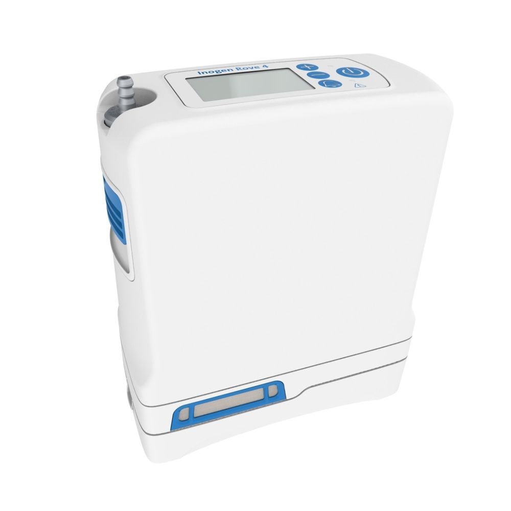 Witte zuurstofconcentrator met blauwe accenten. Rechthoekige vorm met display en knoppen. Inogen Rove 4.