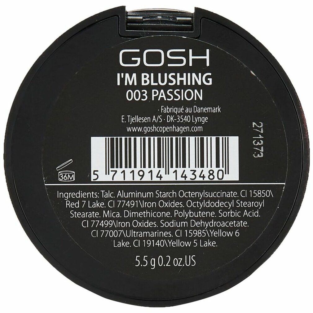 Fond de boîtier cosmétique rond noir avec informations produit. Contient texte, code-barres et ingrédients. "GOSH I'M BLUSHING 003 PASSION".