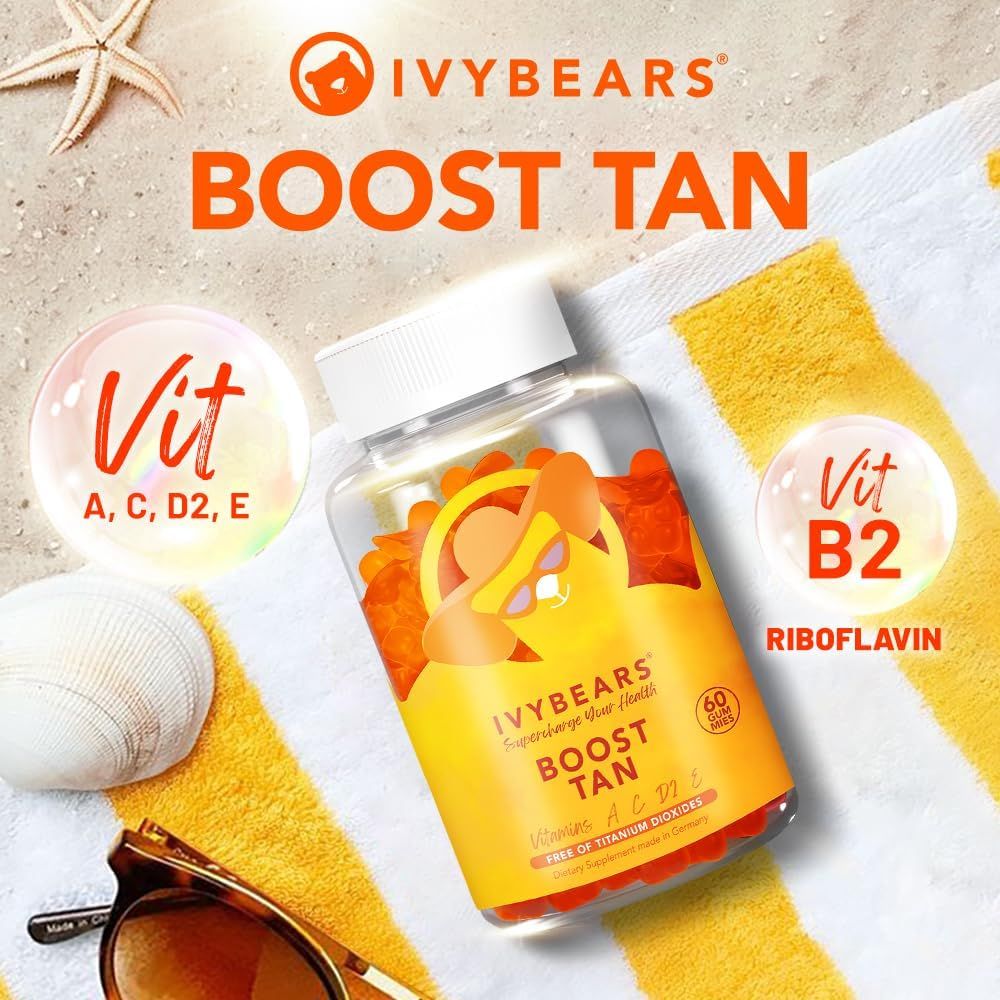 IvyBears Boost Tan gummies-fles op een handdoek. Met vitamine A, C, D, E en B2. Zonnebril.