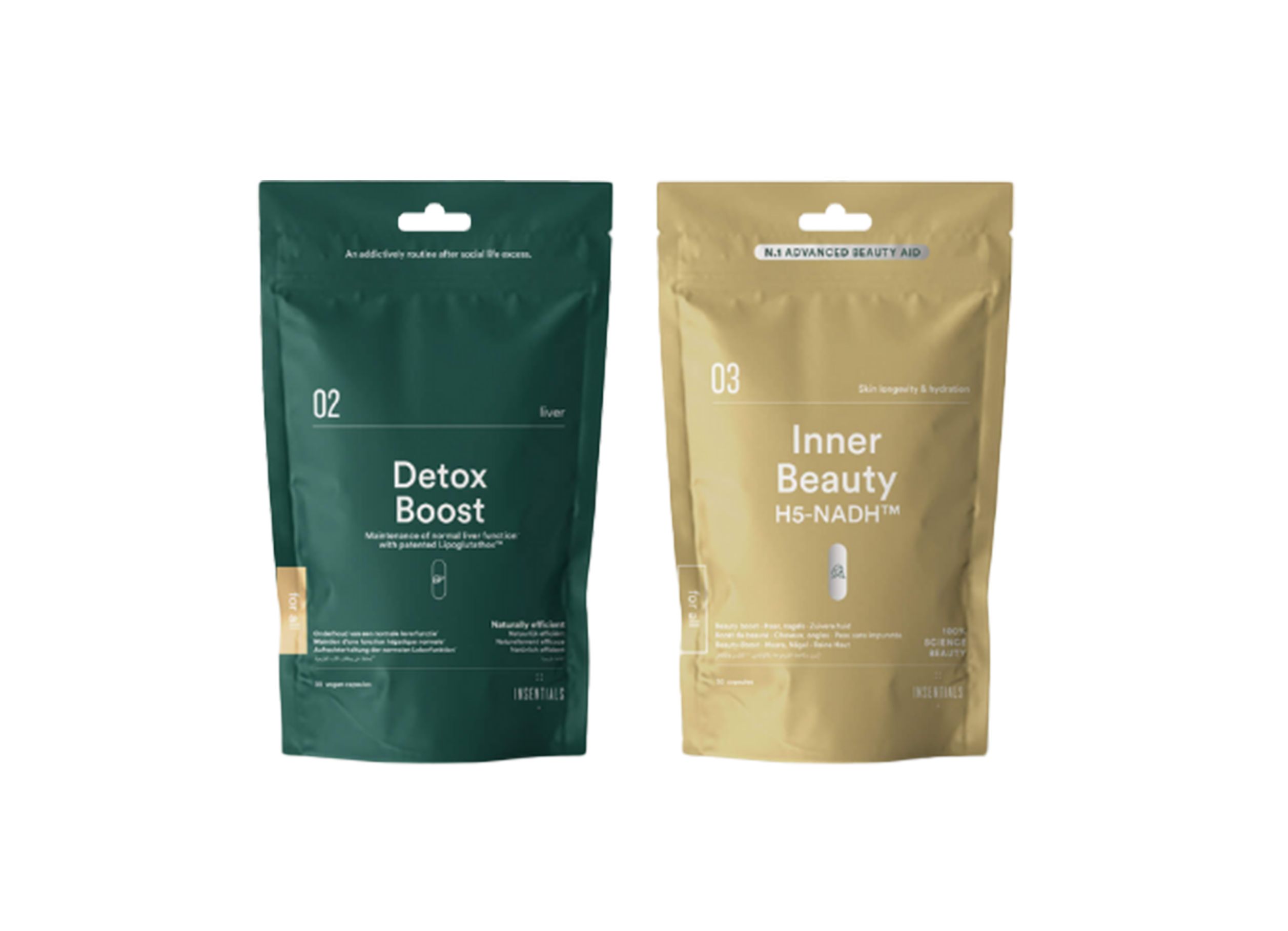 Twee zakjes. Eén groen met "Detox Boost", de andere goudkleurig met "Inner Beauty". Beide met ophanggat.