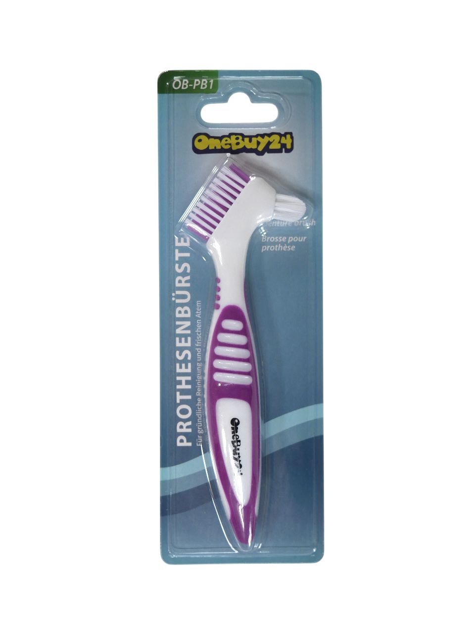 Brosse à dents pour prothèses en blister. Manche blanc avec accents violets. Inscription : OneBuy24, brosse pour prothèse.